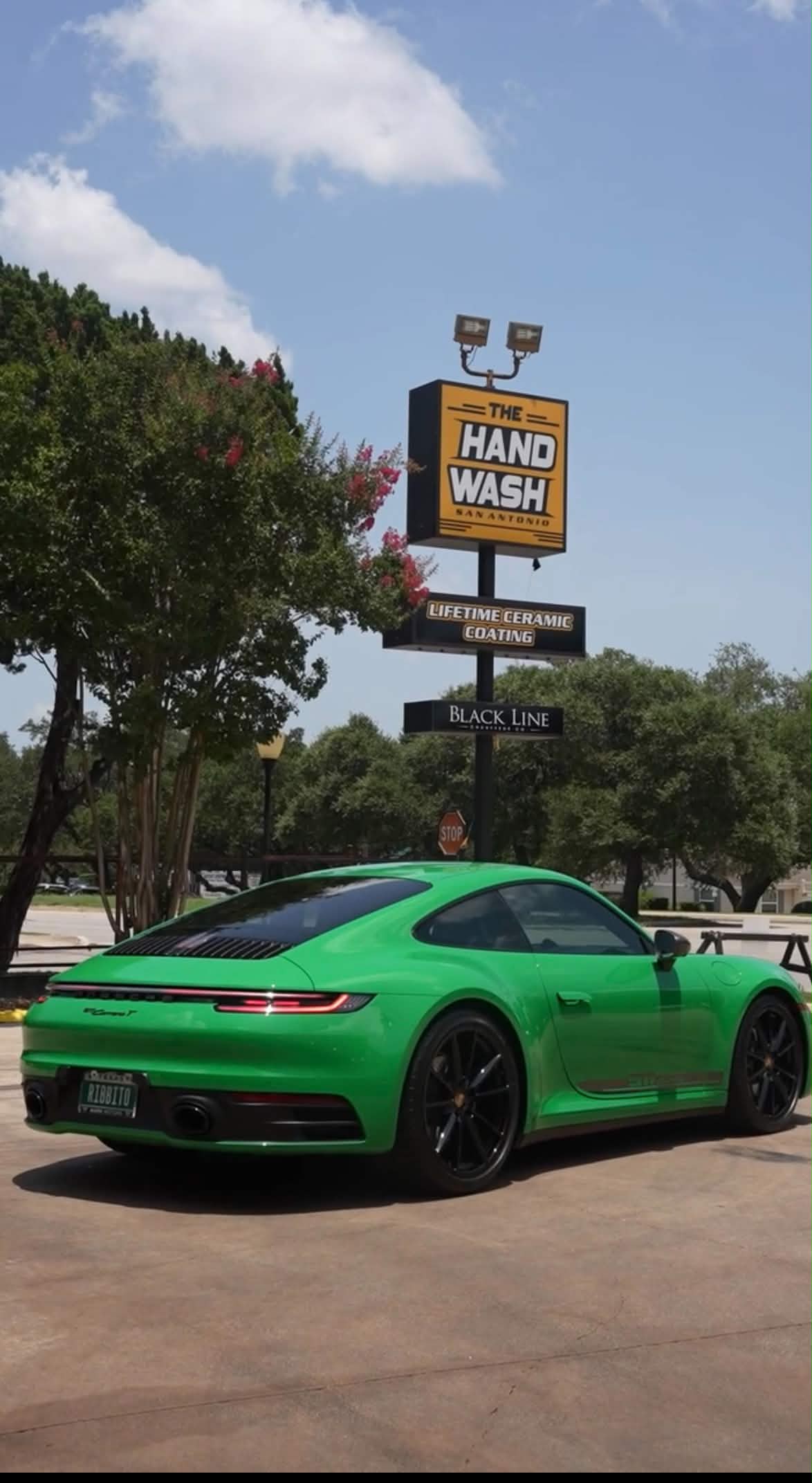 Green Porsche outside The Hand Wash San Antonio